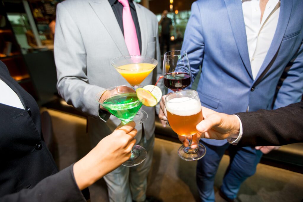 Group of Businessmen Toasting Glasses